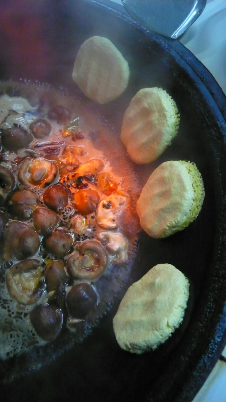 hot pot with corn meal cakes